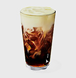 A glass of ice coffee with cream at the top