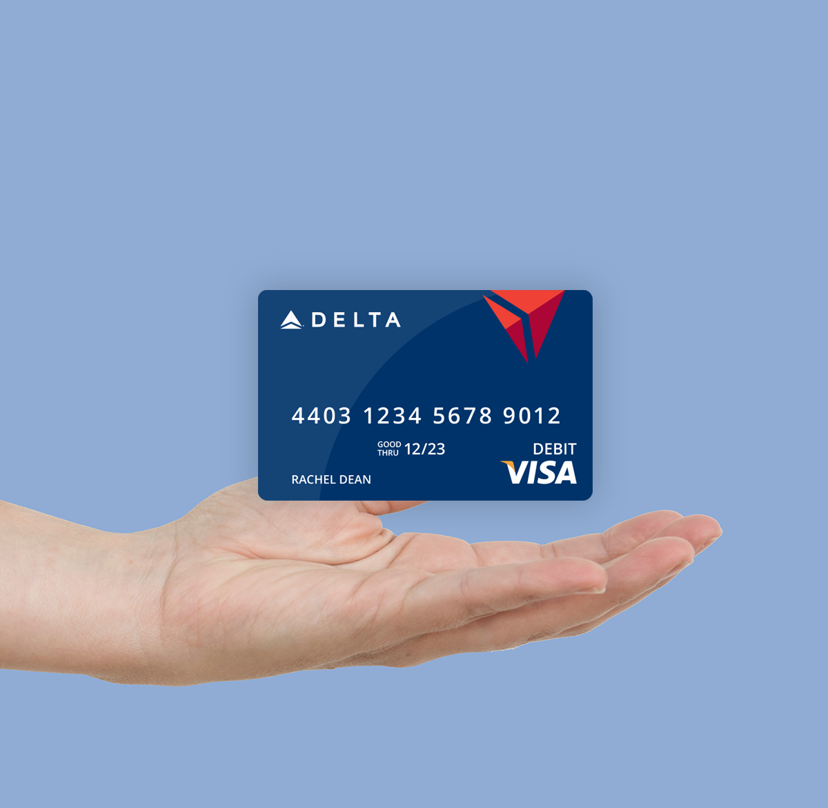 hand holding delta branded virtual visa card