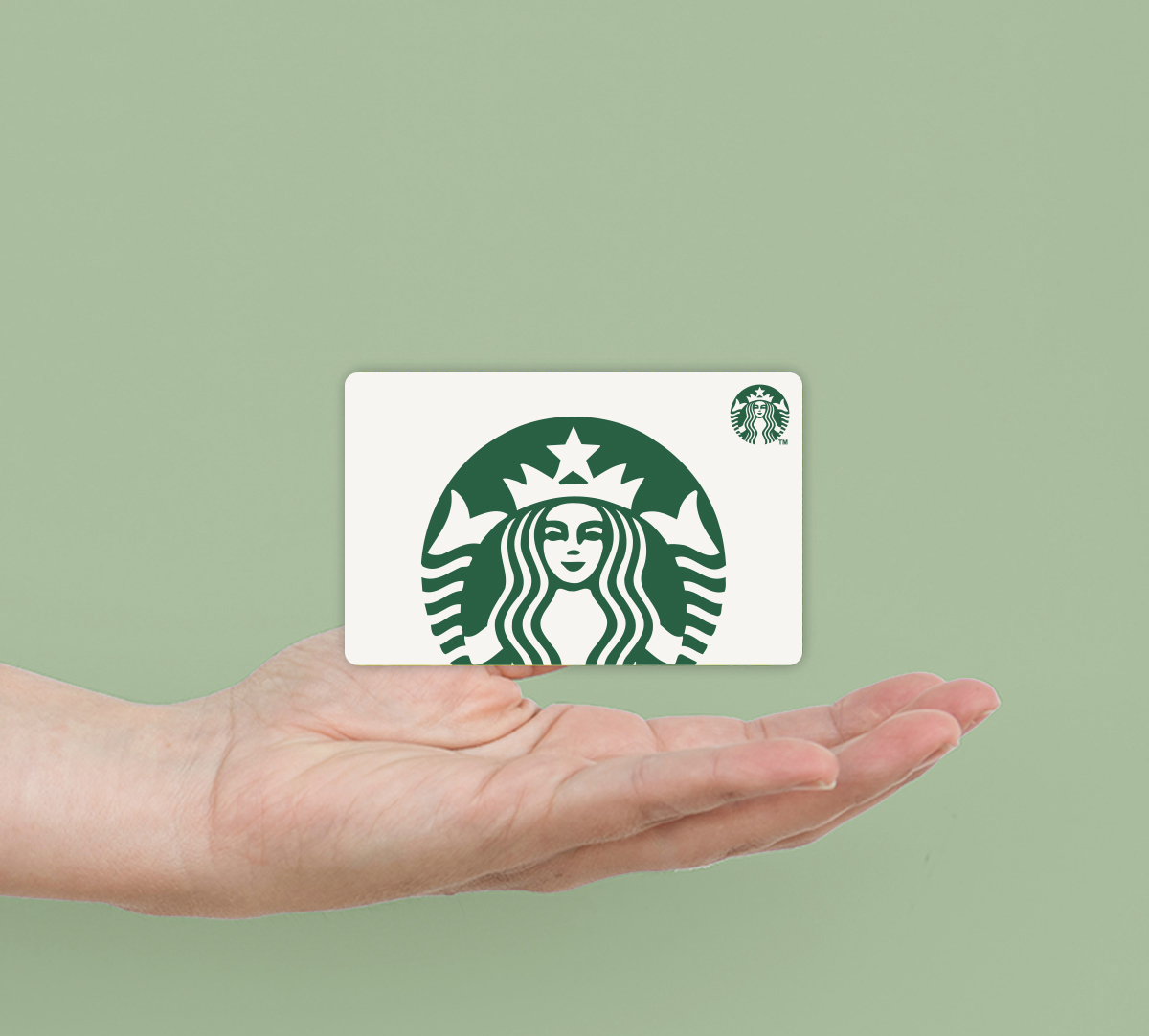 hand holding starbucks gift card